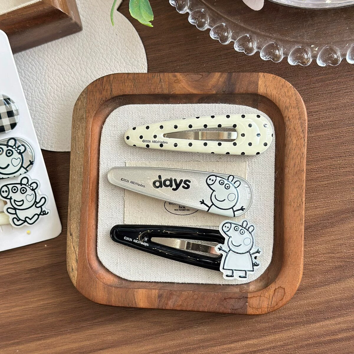 Peppa Pig dot days and black enamel water drop snap clips detail