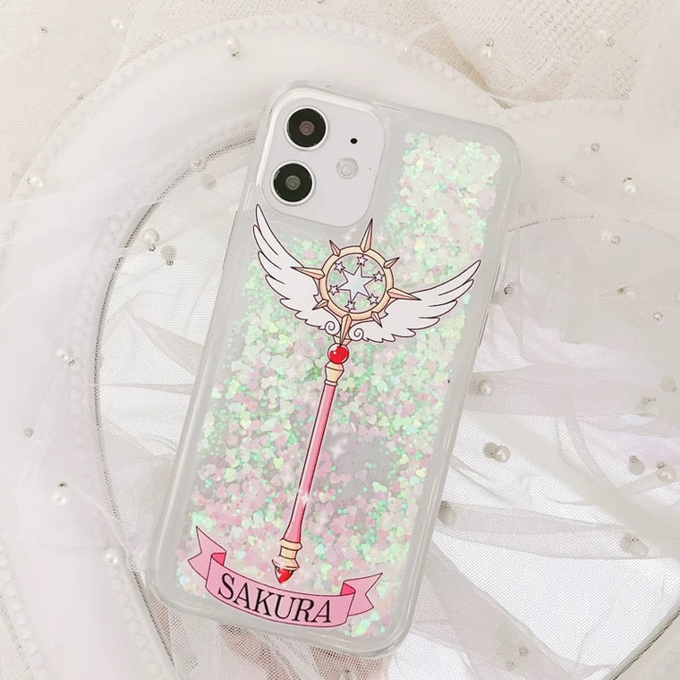 Japanese Cartoon CardCaptorSakura Magic Wand with Wings - Silver Pink Heart Glitter QuickSand iPhone Case 6 7 8 PLUS SE2 XS XR X 11 12 13 14 15 16 Pro Promax 12mini 13mini KawaiiGiftLand