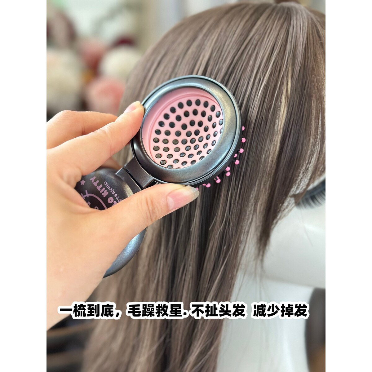 Hello Kitty folding comb packaging card front and back with official Sanrio licence label