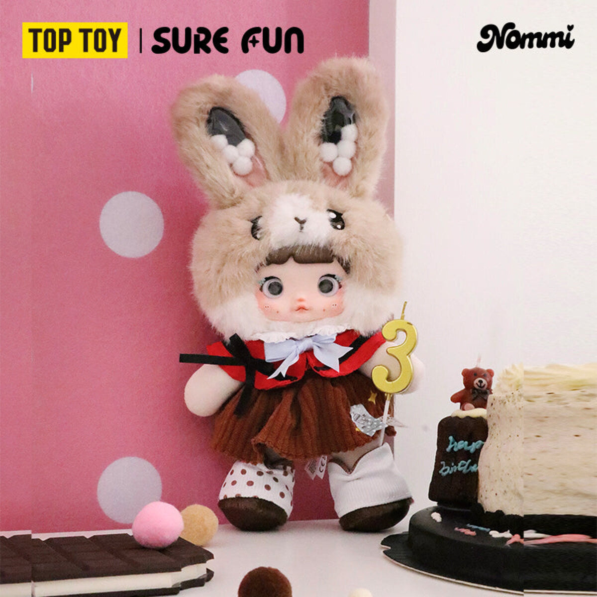 Nommi Treasure Collector Series Milk Tea Collector plush doll on a birthday display
