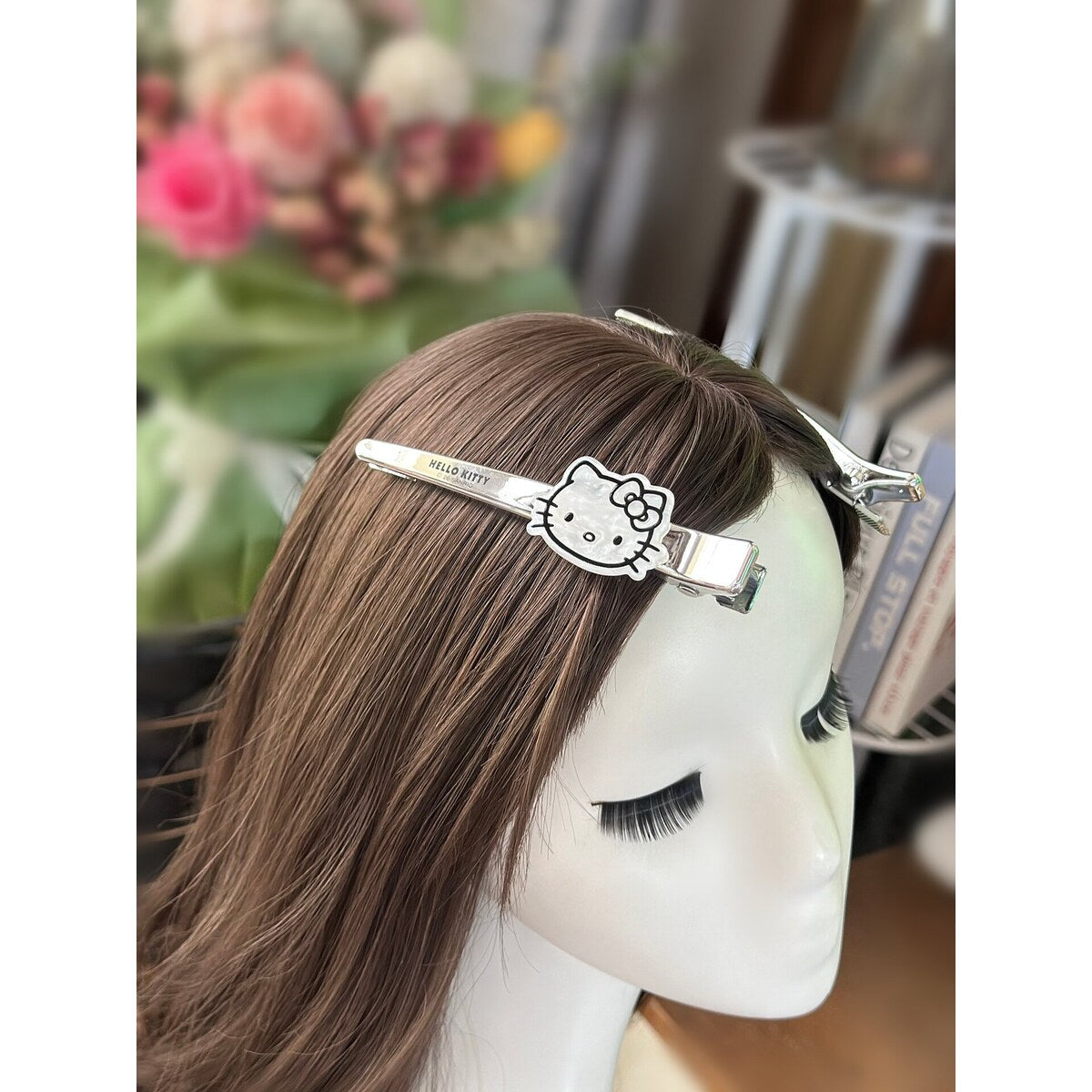 Hello Kitty extra large bar hair clip styled on long hair - no-crease bangs clip