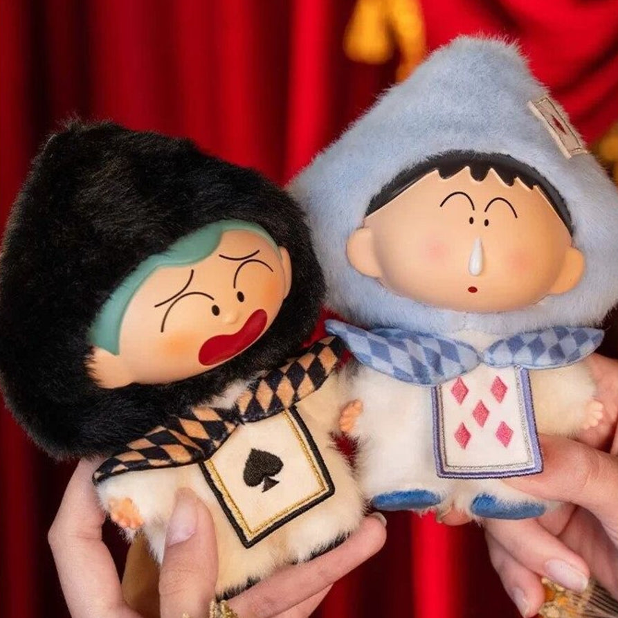 Masao and Adai Crayon Shin-chan vinyl plush pendants held in hand