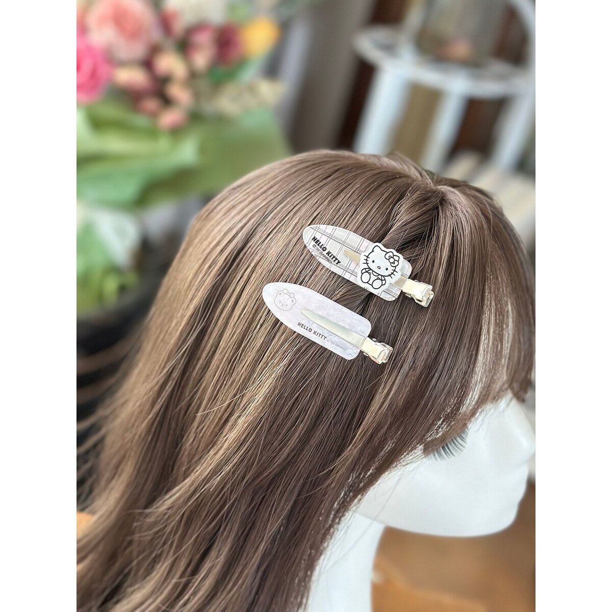 Hello Kitty heart clip set styled in hair - no-crease bangs clips