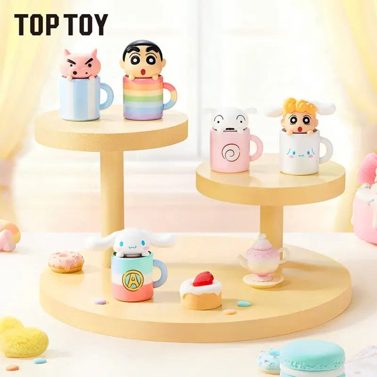 Crayon Shin-chan x Cinnamoroll Teacup Series figures on a cake stand in a pink room