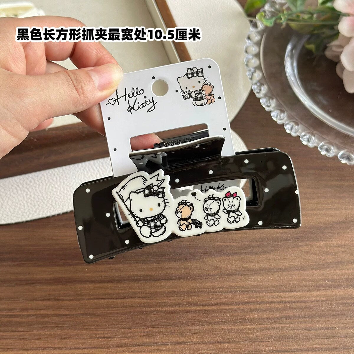 Hello Kitty black rectangular claw clip 10.5cm with Kitty and friends charm