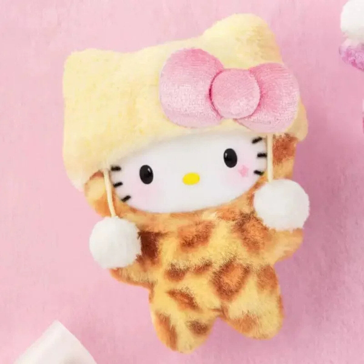 Hello Kitty Leopard Series Lemon Shine plush charm on pink background