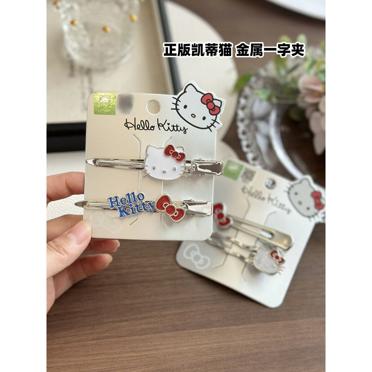 Licensed Hello Kitty silver metal no-crease hair clips 2-piece set on branded card