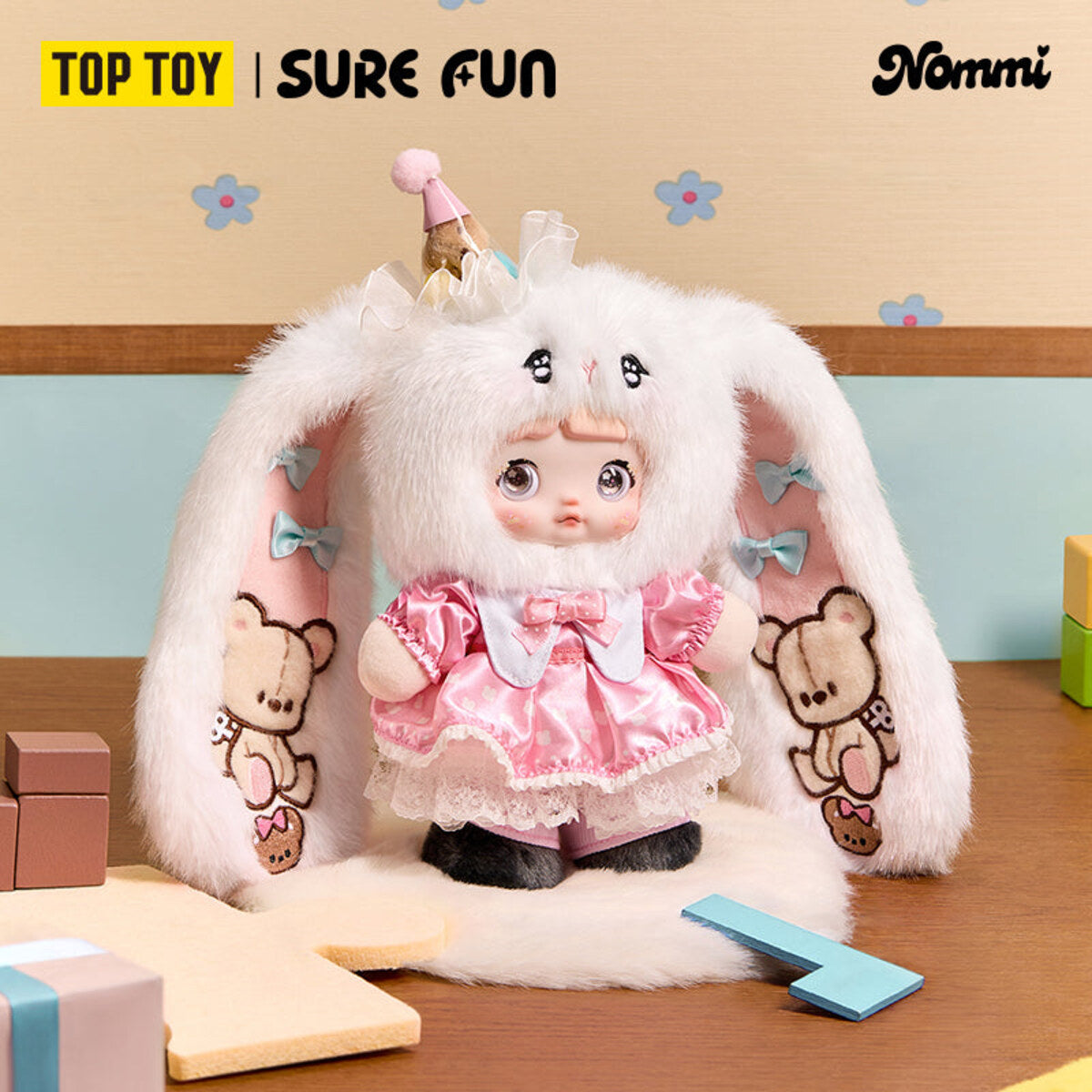Nommi Treasure Collector Series Doll Collector plush doll in a white bunny hood with teddy bear ear charms