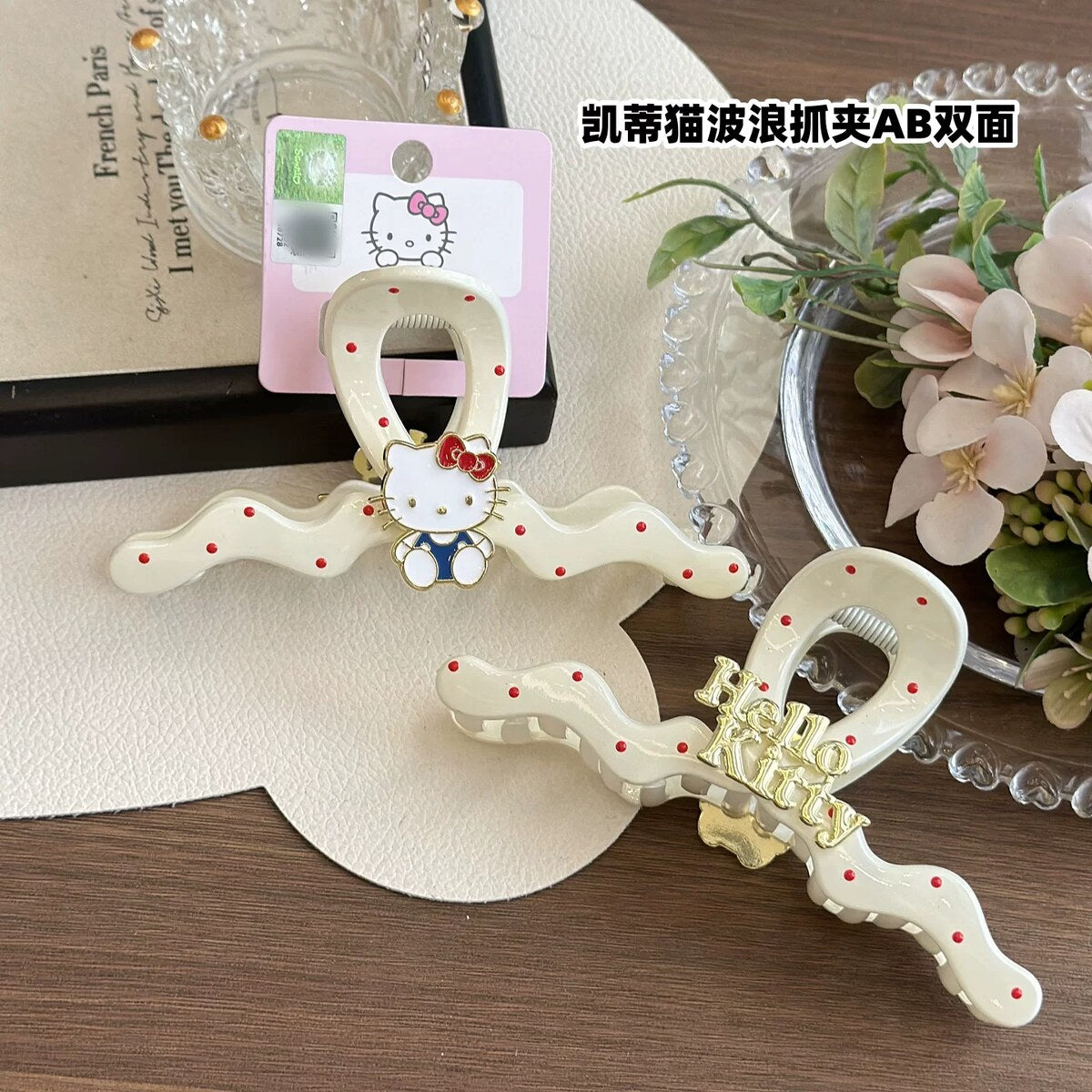 Both Hello Kitty claw clip styles - classic bar clip and wavy-edge double-sided clip