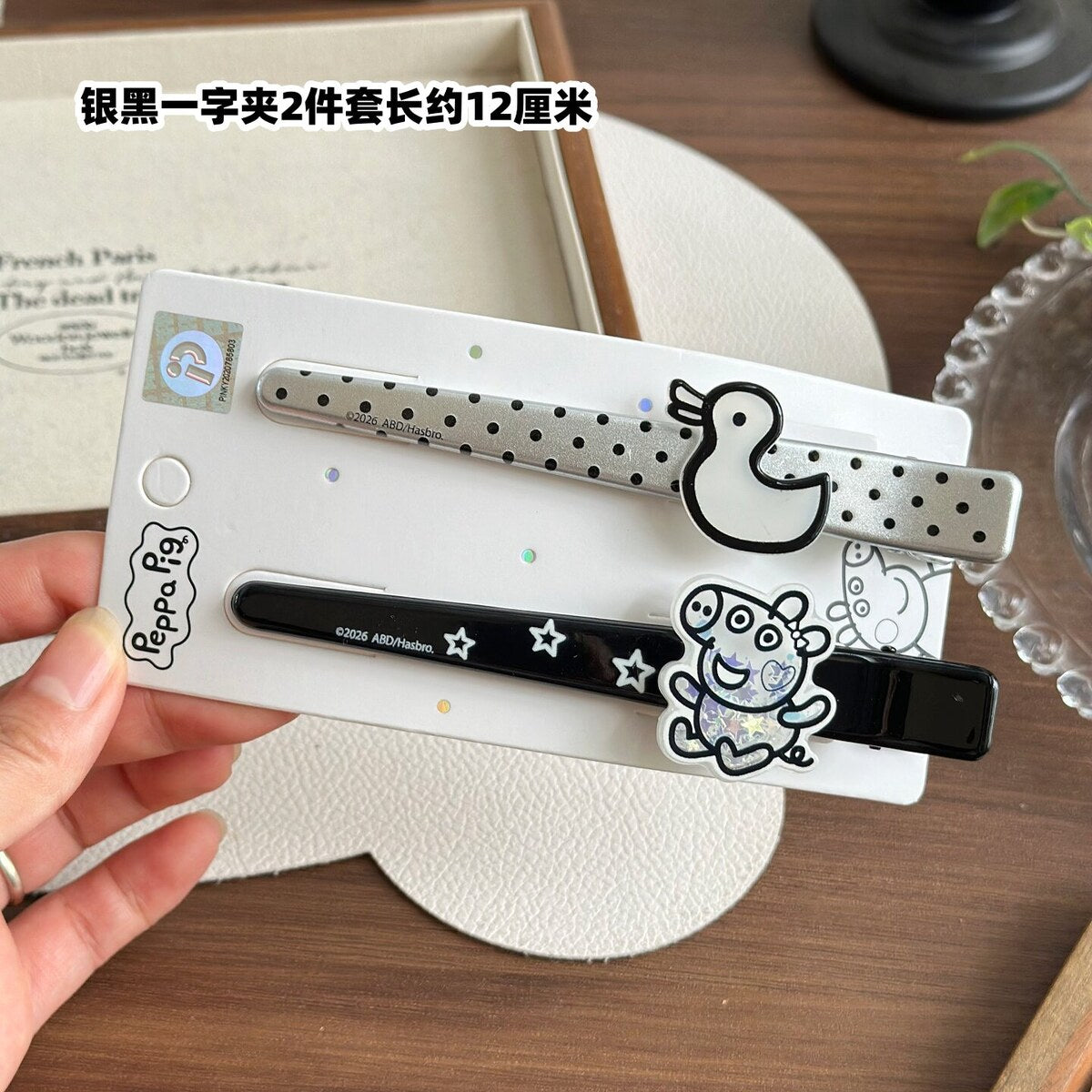 George polka dot duck and black star bar clip 2-piece set, approx 12cm
