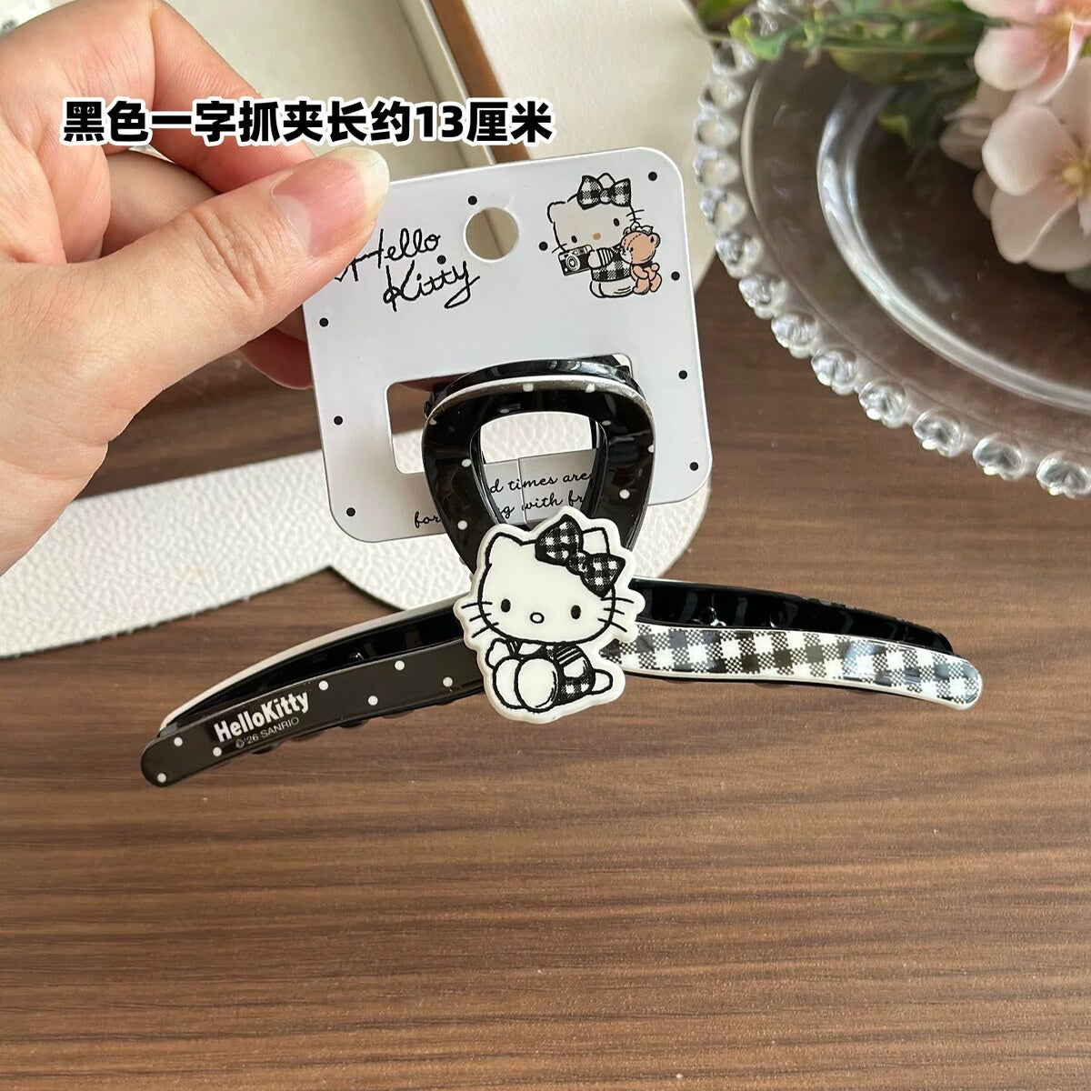 Hello Kitty black wishbone claw clip 13cm with gingham bow print