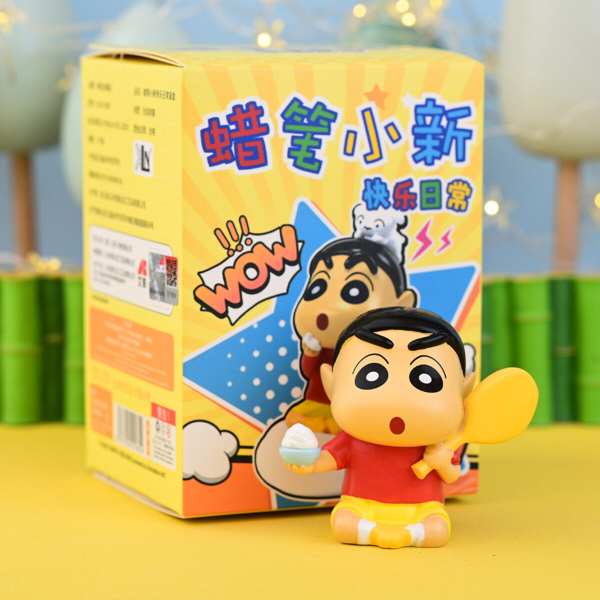 Crayon Shin-chan Let's Start Eating figure holding a bowl of rice and a yellow rice paddle