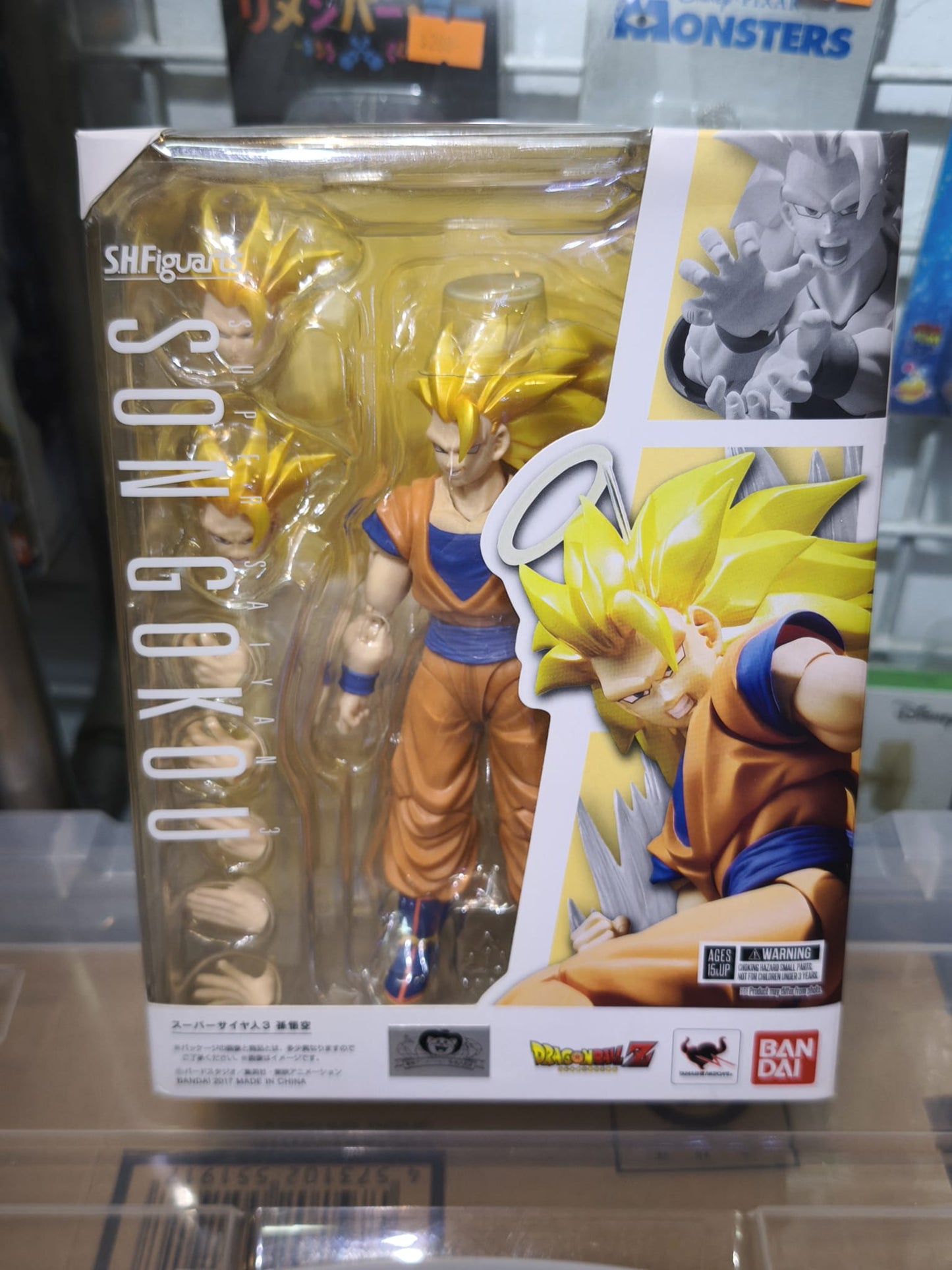 Front packaging of Bandai S.H.Figuarts Super Saiyan 3 Son Goku action figure in window display box with Dragon Ball Z branding.
