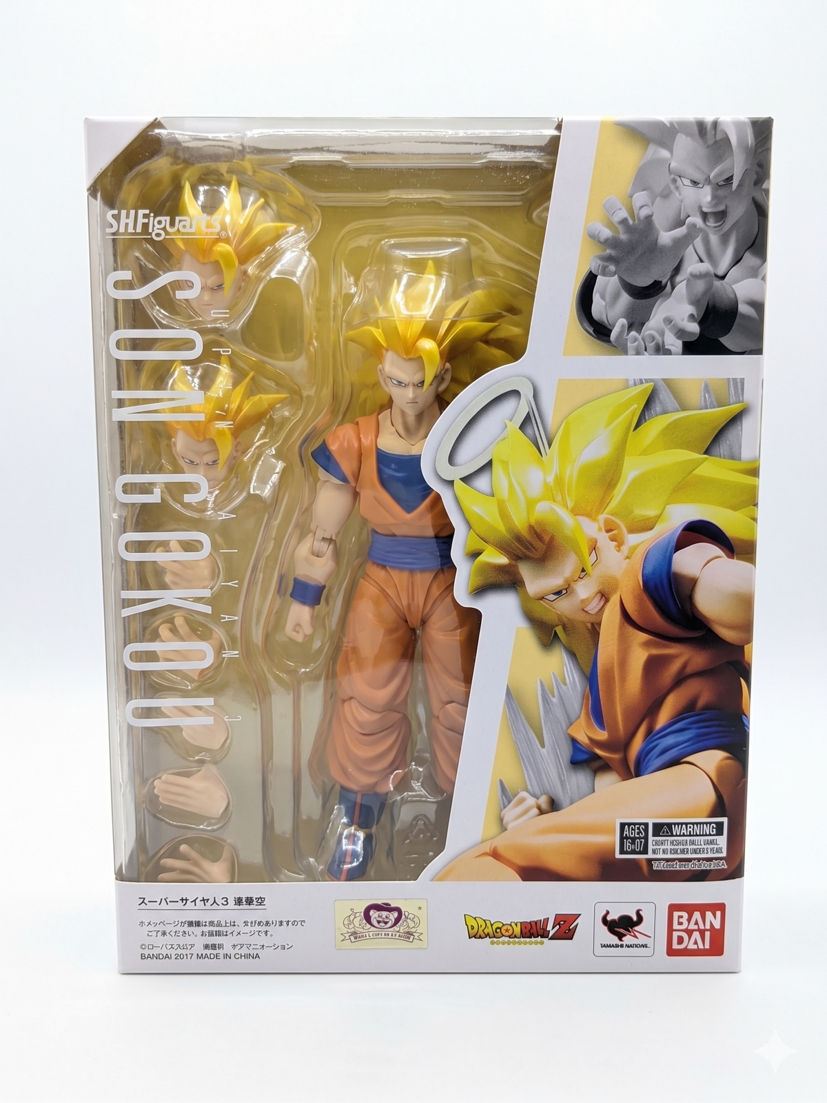 Front packaging of Bandai S.H.Figuarts Super Saiyan 3 Son Goku action figure in window display box with Dragon Ball Z branding.