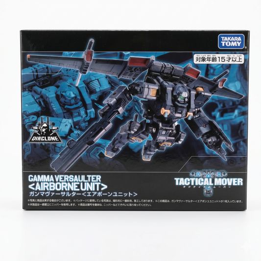 Front panel of the Takara Tomy Diaclone box featuring a dramatic illustration of the dark grey Gamma Versaulter Airborne Unit flying with its wings deployed against a high-tech blue grid background.