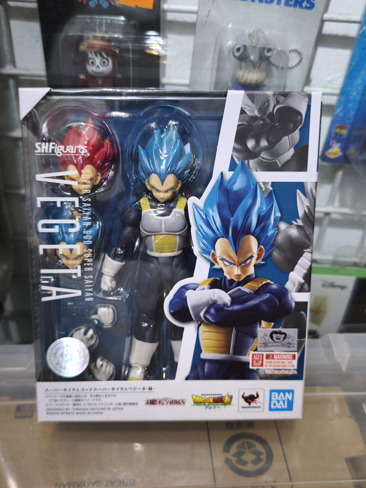 Front window box packaging of the Bandai S.H.Figuarts Super Saiyan God Super Saiyan Vegeta -Super- action figure with movie branding and interchangeable red head displayed.