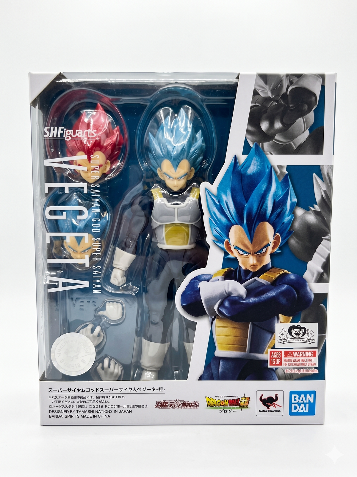 Front window box packaging of the Bandai S.H.Figuarts Super Saiyan God Super Saiyan Vegeta -Super- action figure with movie branding and interchangeable red head displayed.