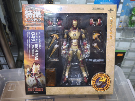 Front window box packaging of the Kaiyodo Sci-Fi Revoltech No. 049 Iron Man Mark XLII action figure with gold-dominant armor plating and official Marvel licensing seals.