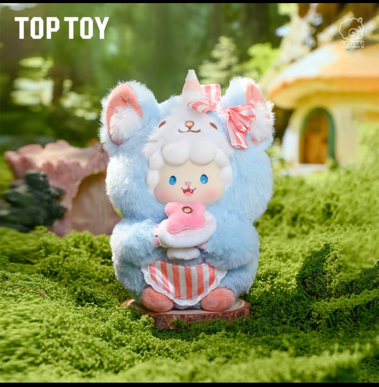Gyun Big-Tailed Critter Crew plush figure inside a fluffy light blue mouse or chipmunk costume with a pink-and-white striped bow, holding a flower pastry.