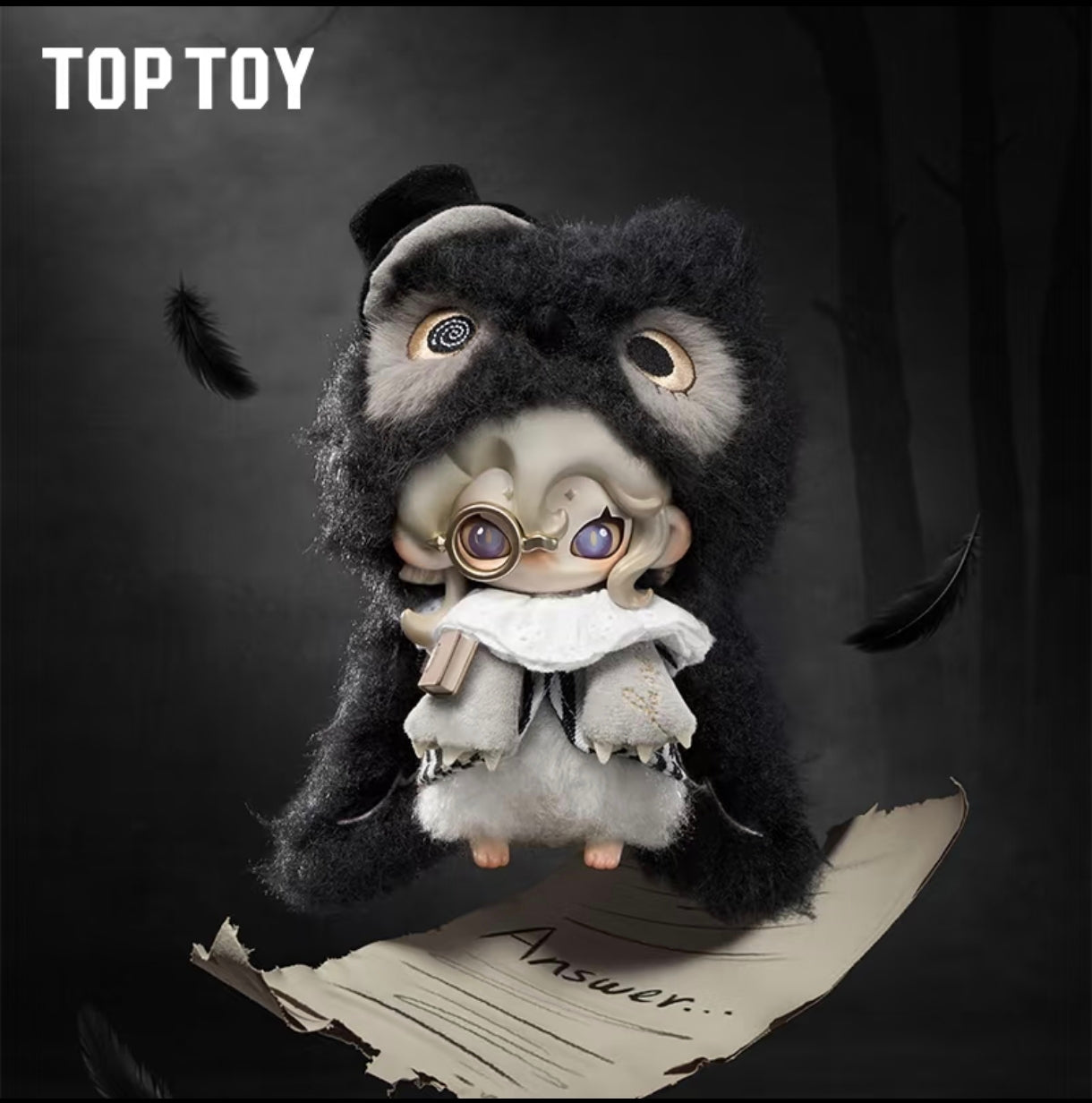 Moonin The Shrouded Night plush character dressed in a black furry owl costume with a small black top hat, holding a scroll that reads "Answer...".