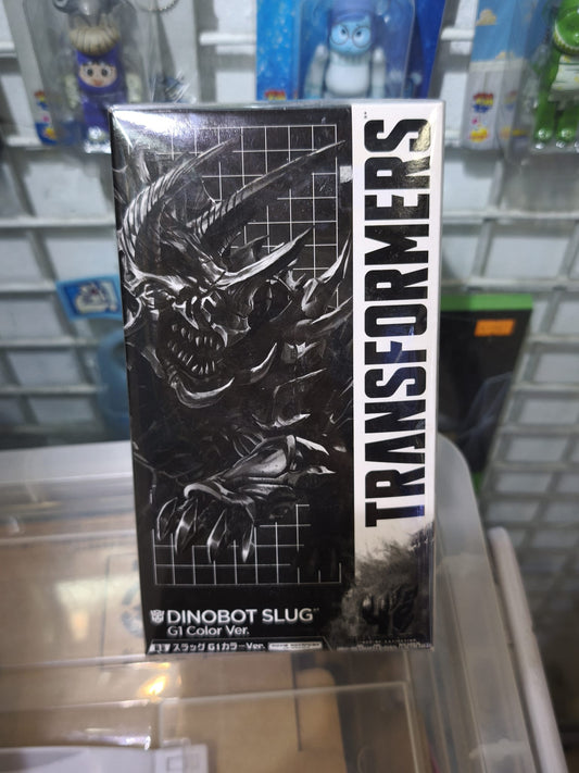 The rear packaging of the Takara Tomy Transformers Movie Advanced Dinobot Slug G1 Color Version, showing the step-by-step 16-stage conversion process from a robotic medieval knight into a mechanical G1-colored Triceratops, highlighting the storage layout of the dual swords.