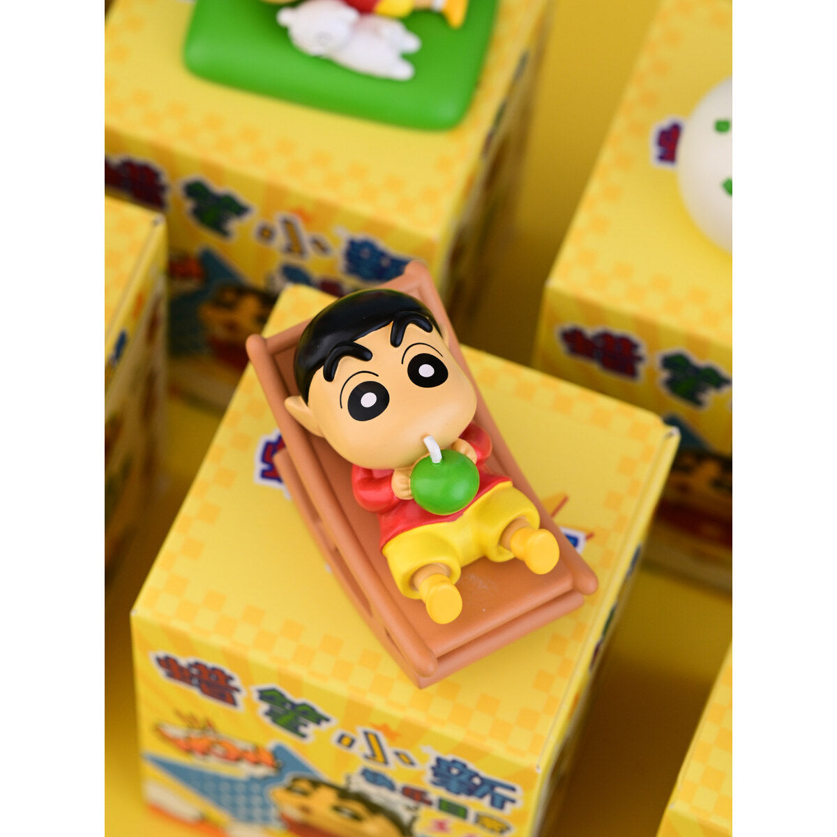 Crayon Shin-chan A Leisurely Holiday figure lying back in a lounge chair with a green soda
