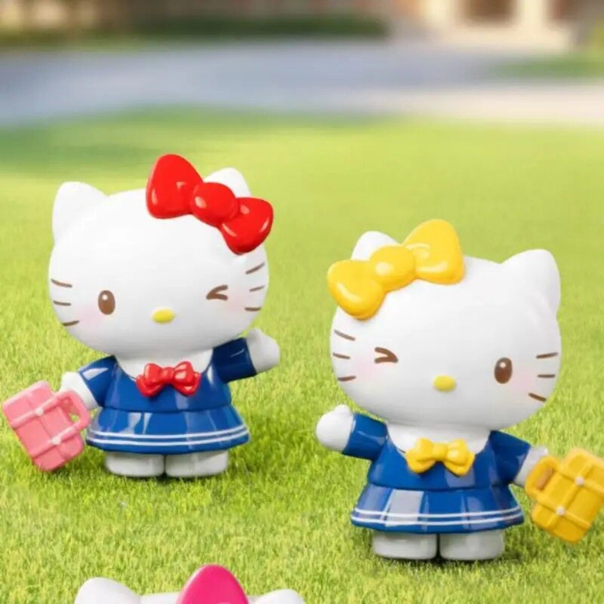Hello Kitty Little Family Series Going to School mini figure pair - opened box, sealed bag