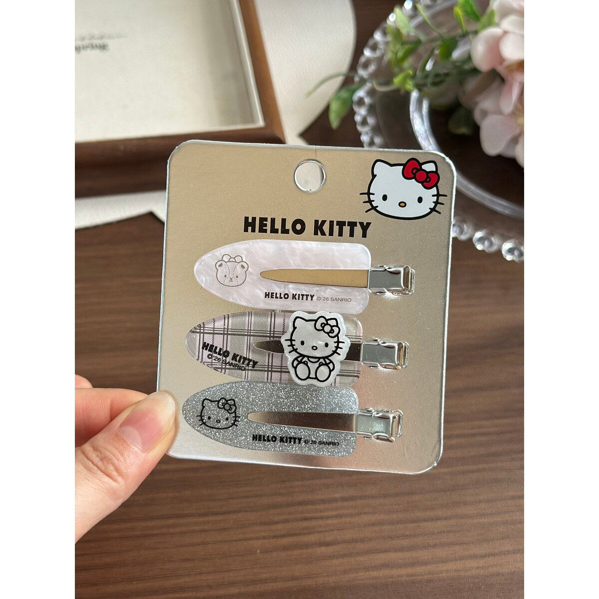Hello Kitty acrylic heart clip set on official Hello Kitty backing card