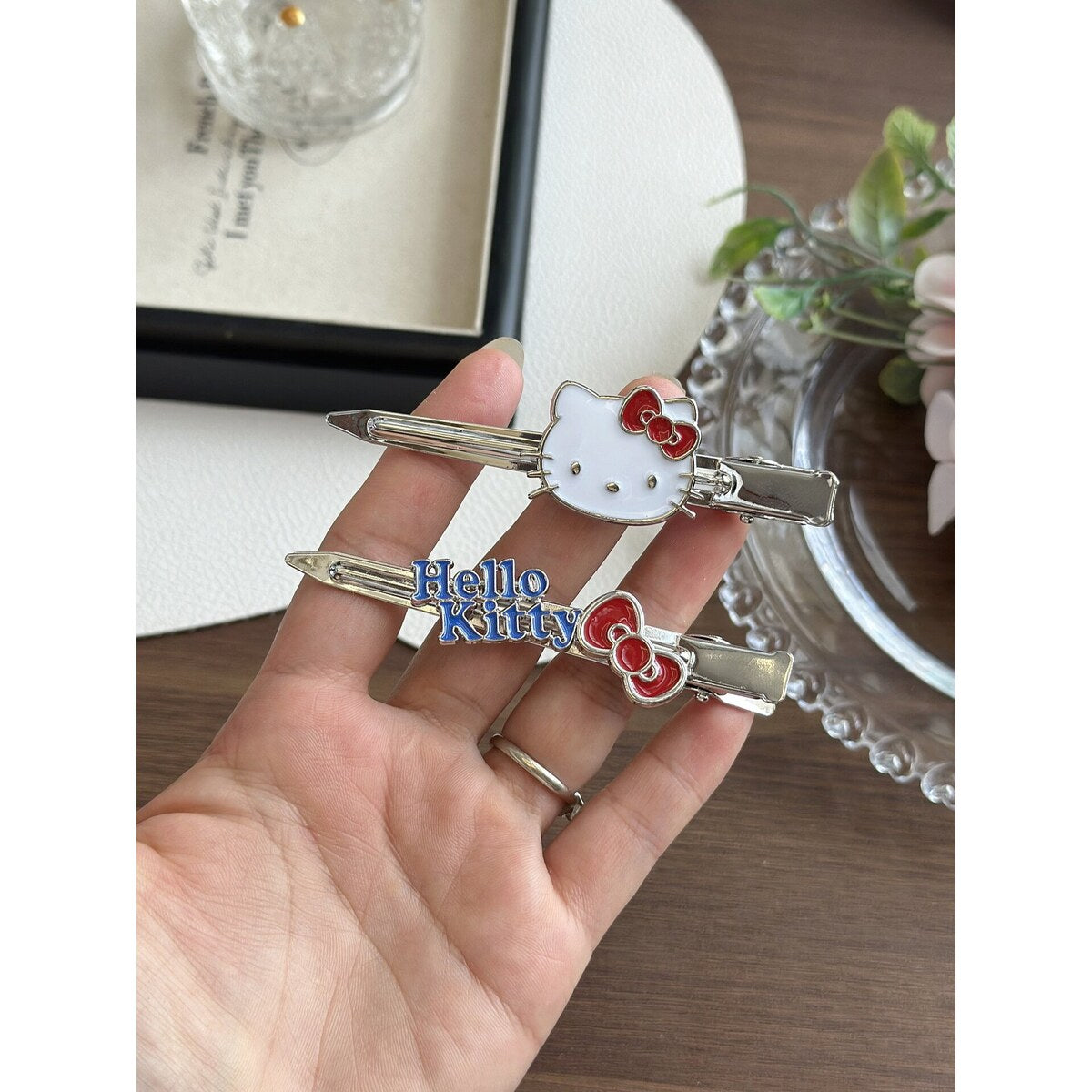 Hello Kitty metal no-crease bobby pin clips worn on side hair