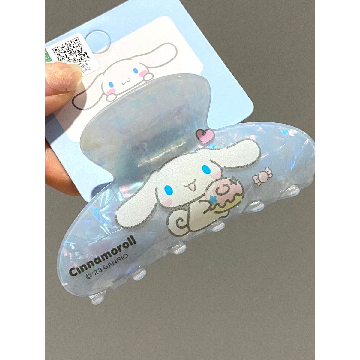 Cinnamoroll holographic claw clip on official Sanrio hanging card